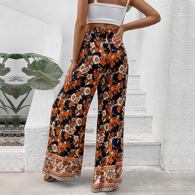 Damen Hochtaillierte weite Palazzohose mit floralem Alloverprint und Eingrifftaschen Shop Nory