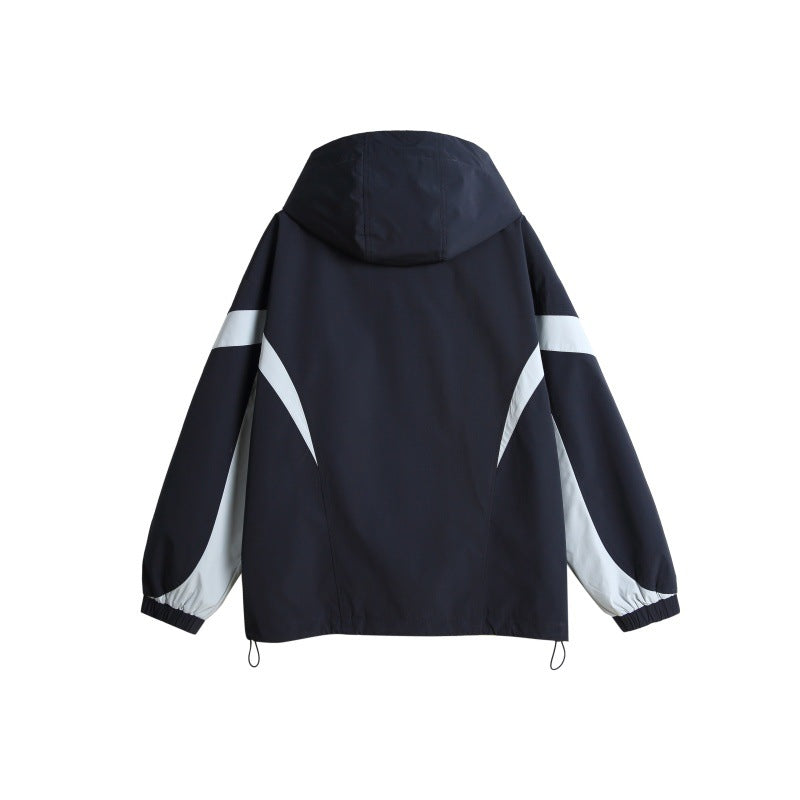 Unisex Technische Kapuzen‑Windbreakerjacke im Boxy‑Cut mit kontrastierenden Paneelen und wasserabweisenden Reißverschlüssen Shop Nory