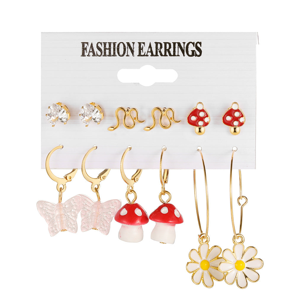 Damen Ohrringe Set mit verspielten Designs und funkelnden Elementen Shop Nory
