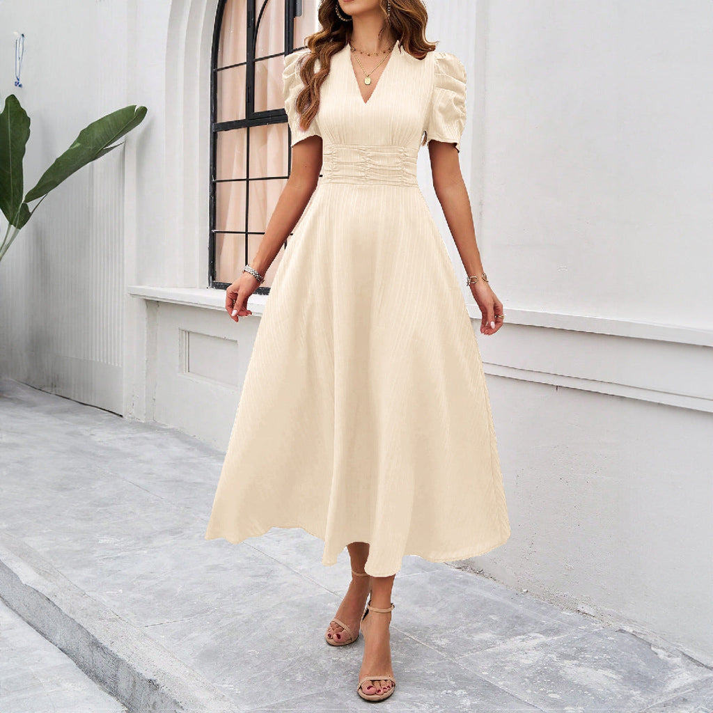 Damen Maxikleid mit elegant verarbeiteten Puffärmeln und taillierter Silhouette Shopnory