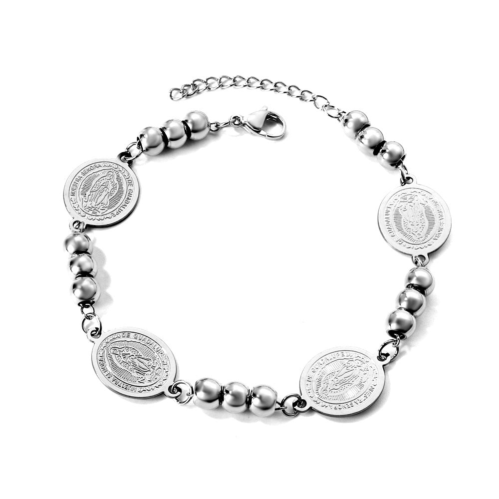 Damen Armband aus goldplattiertem Edelstahl mit Münz- und Perlenverzierungen Shop Nory