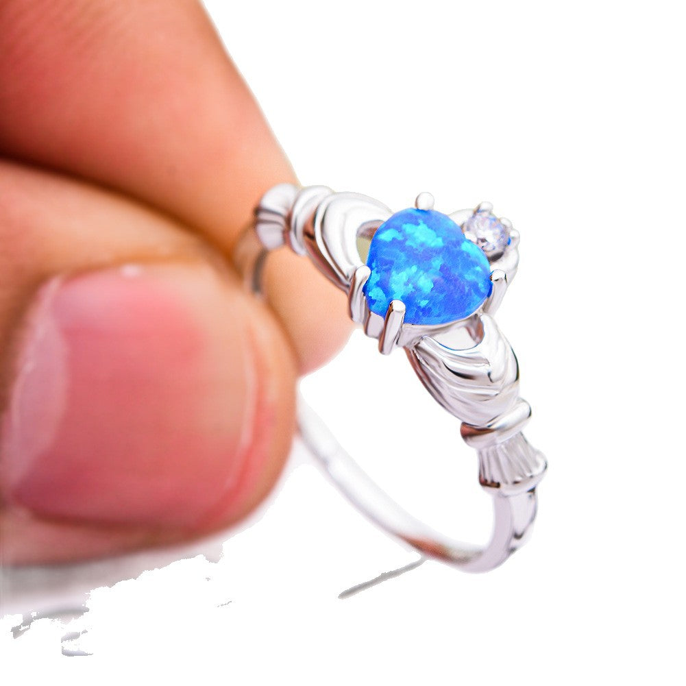 Damen Ring mit herzförmigem Opal und funkelnden Zirkonia-Elementen Shop Nory