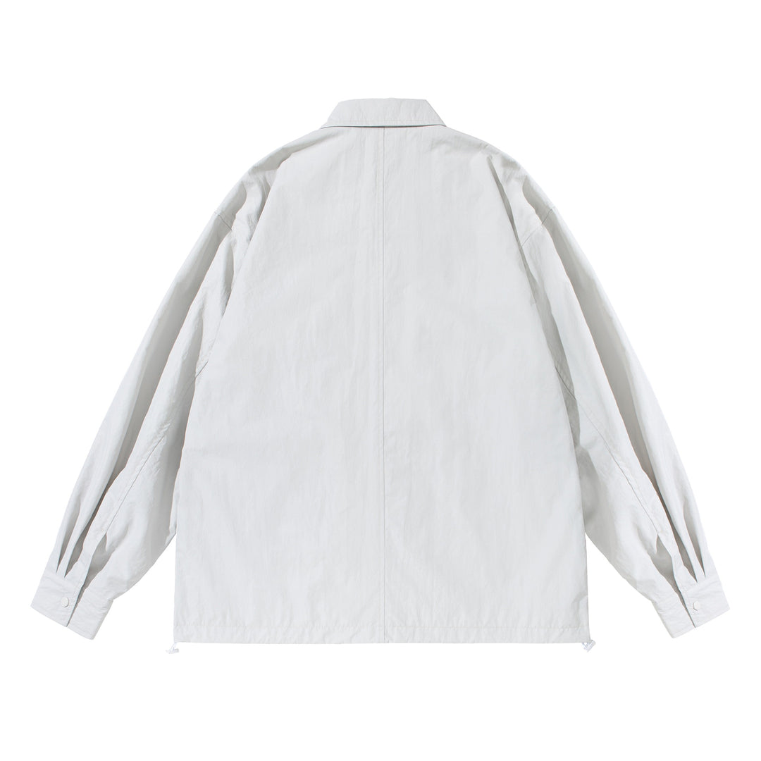 Unisex Oversize-Hemdjacke mit Druckknopfleiste und Pattentaschen Shop Nory