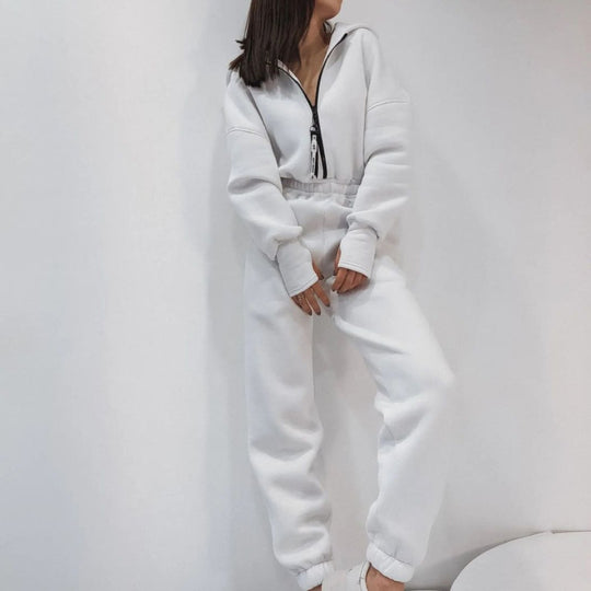 Damen taillierter Sweat-Jumpsuit mit halbem Reißverschluss, elastischem Bund und Kängurutaschen Shop Nory