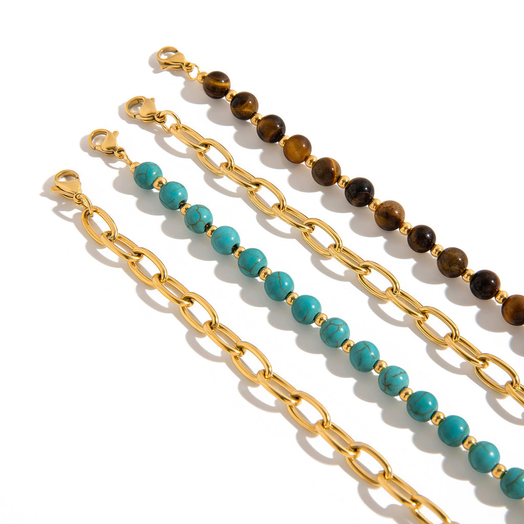 Damen Armband mit goldfarbener Edelstahlkette und charmanten Steinakzenten Shop Nory