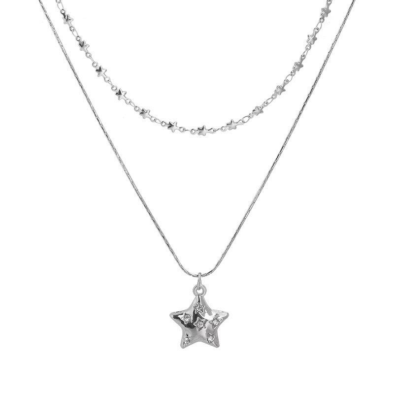 Damen Halskette mit funkelndem Sternanhänger und eleganter Gliederkette Shop Nory