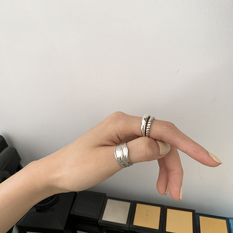 Damenring mit elegantem, mehrschichtigem Design und feinen Details Shop Nory