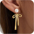 Damen Ohrringe mit eleganter Schleifenform und Perle Shop Nory