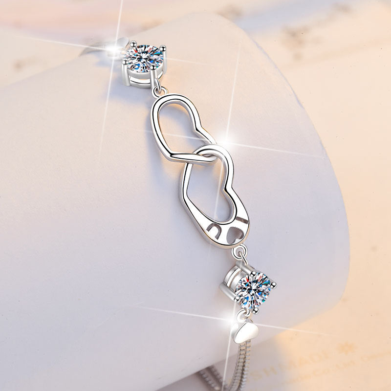 Damenarmband mit Herzdesign und funkelnden Kristallen Shop Nory