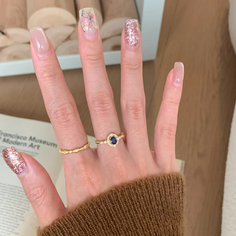 Damenring mit strahlendem blauen Edelstein und funkelnden Zirkonia Shop Nory