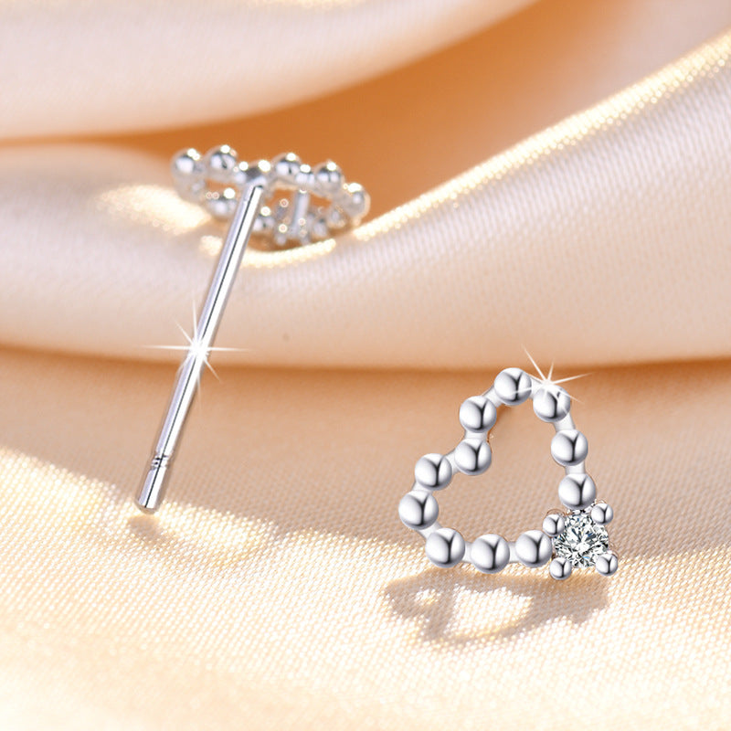 Damen Ohrringe im herzförmigen Design mit funkelnden Zirkonia Shop Nory