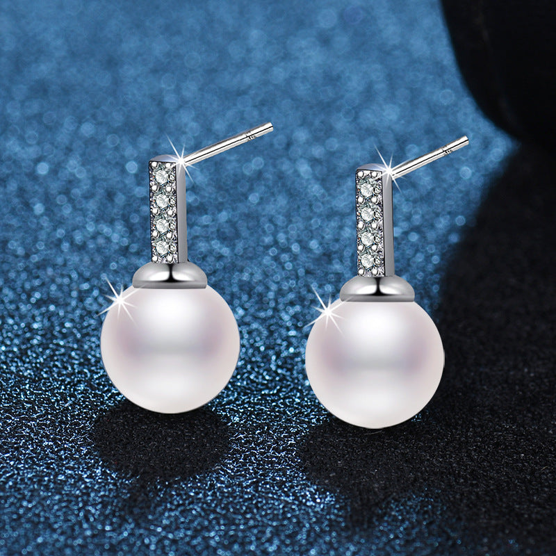 Damen elegante Ohrringe mit Perlen und Zirkonia-Details Shop Nory