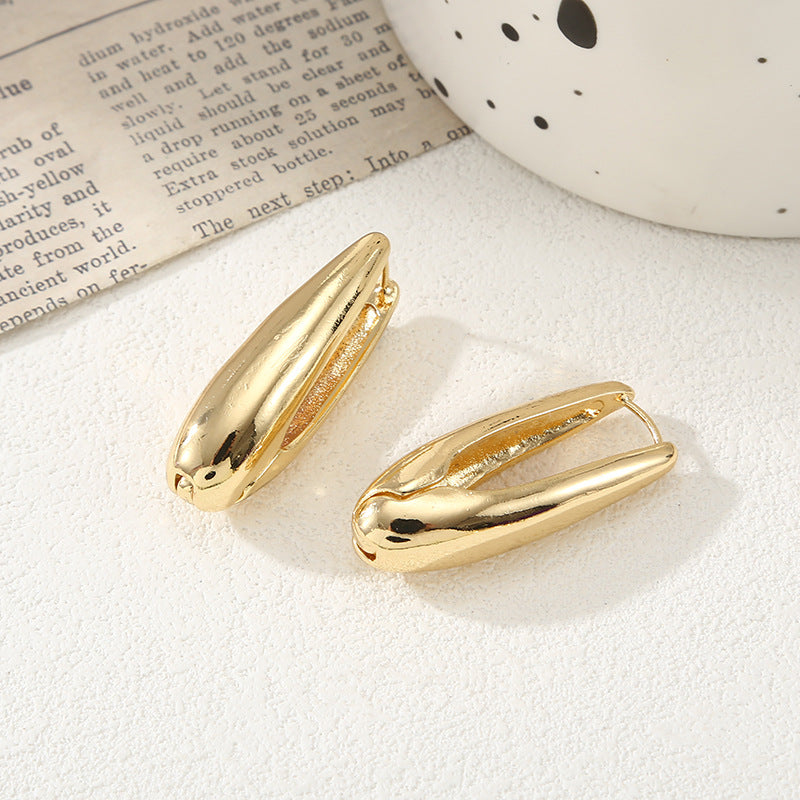 Damen Ohrringe mit elegantem, geschwungenem Design Shop Nory