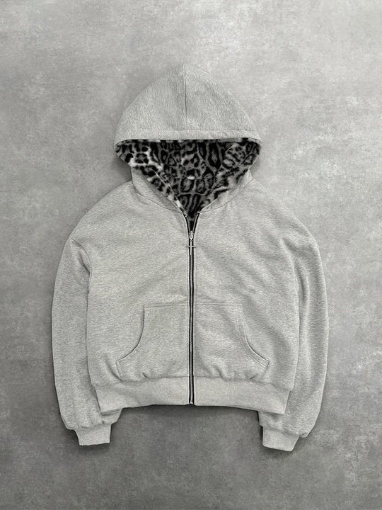 Unisex Kapuzen-Sweatjacke mit Kunstfellfutter, verkürztem Schnitt und Kreuz-Reißverschluss Shop Nory