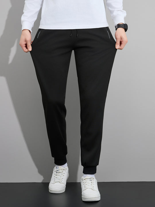 Herren Tapered Performance-Jogginghose mit elastischem Bund, Reißverschlusstaschen & gerippten Beinbündchen Shop Nory