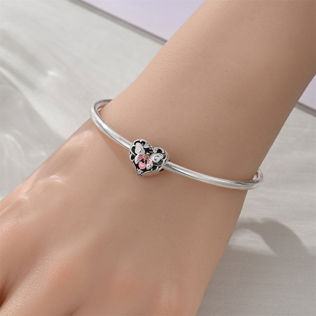 Filigraner Herz-Charms Anhänger mit Rosenmotiv und Zirkonia