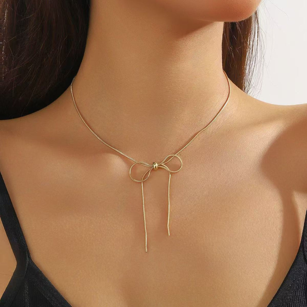 Damen Kette mit funkelndem Schleifenanhänger Shop Nory