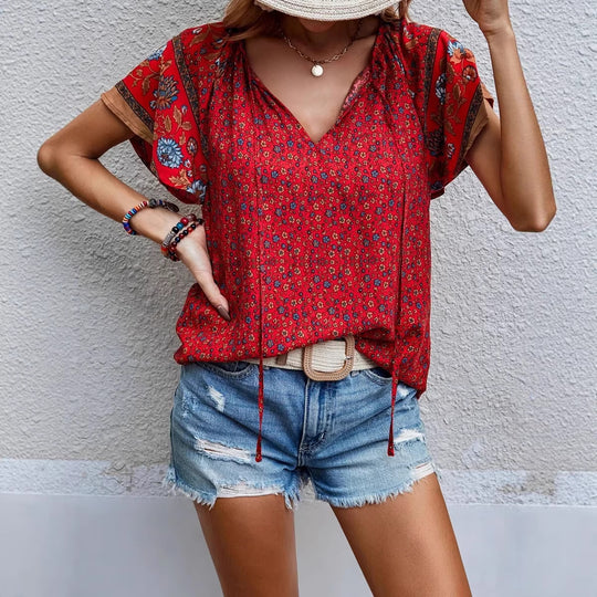 Damen Leichtes Blusenshirt mit V-Ausschnitt, kurzen Kimonoärmeln und floralem Allovermuster Shop Nory