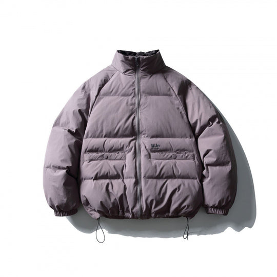 Unisex Boxy wattierte Stehkragen‑Pufferjacke mit Tunnelzugsaum und Pattentaschen Shop Nory