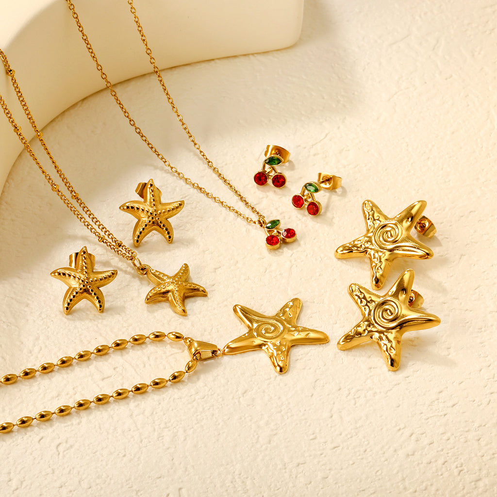Damen Schmuckset mit glänzendem Sternenanhänger und passenden Ohrsteckern Shop Nory
