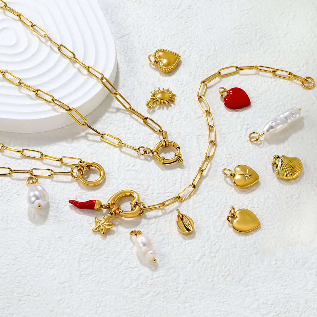 Damen Anhänger aus hochwertiger perlmuttfarbener Süßwasserperle mit goldenem Befestigungsring Shop Nory