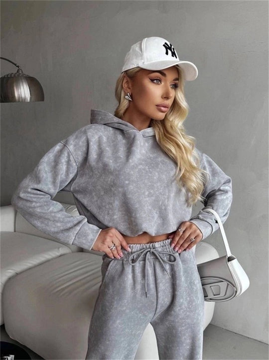 Damen kurz geschnittenes Kapuzenhoodie und hoch geschnittene Jogginghose Set Shop Nory