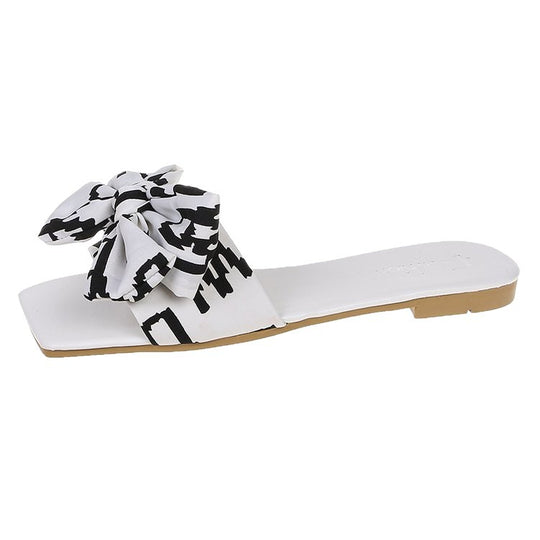 Damen Flache Riemen-Slides mit großem Stoffknoten und quadratischer Zehenpartie Shop Nory