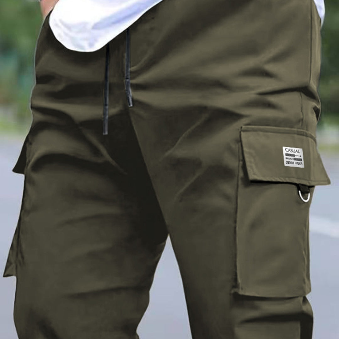 Herren Utility-Cargohose im tapered Schnitt mit elastischem Tunnelzugbund, großen Klapp- und Reißverschlusstaschen Shop Nory