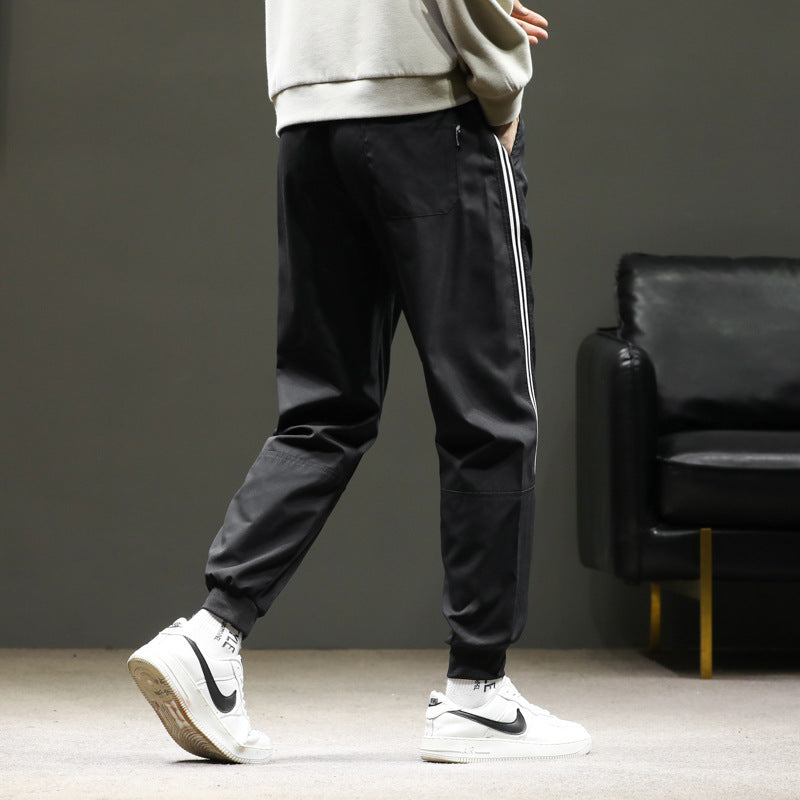 Herren Sportive Jogginghose im Trackstyle mit seitlichen Kontraststreifen, Tunnelzug und elastischen Bündchen Shop Nory