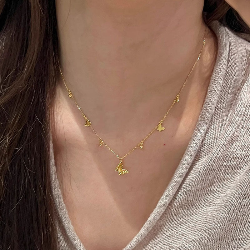 Damen Halskette mit filigranen Schmetterlingsanhängern Shop Nory