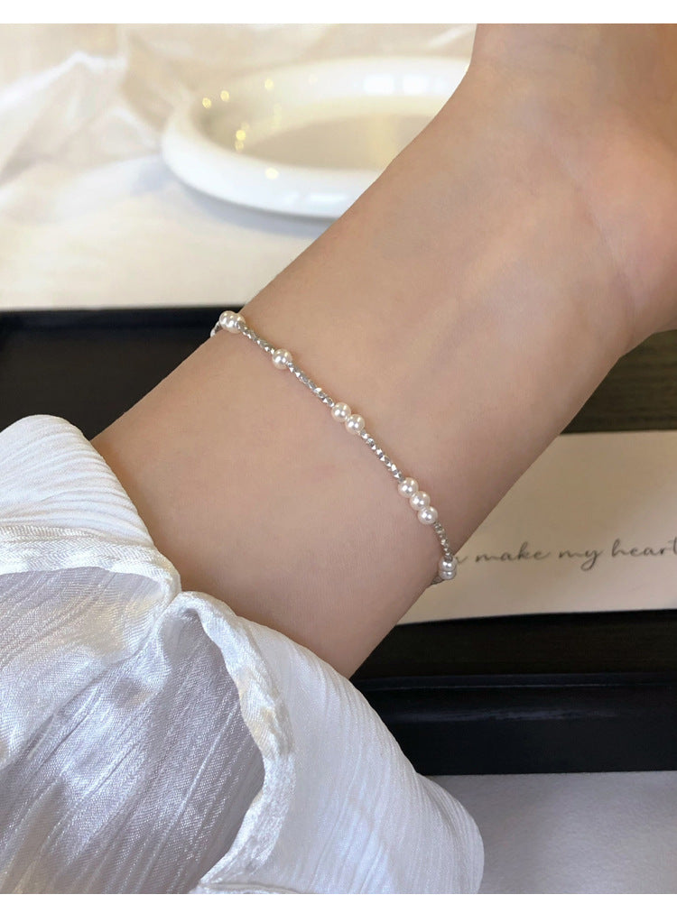 Damen Perlenarmband mit funkelnden Zirkonia Shop Nory