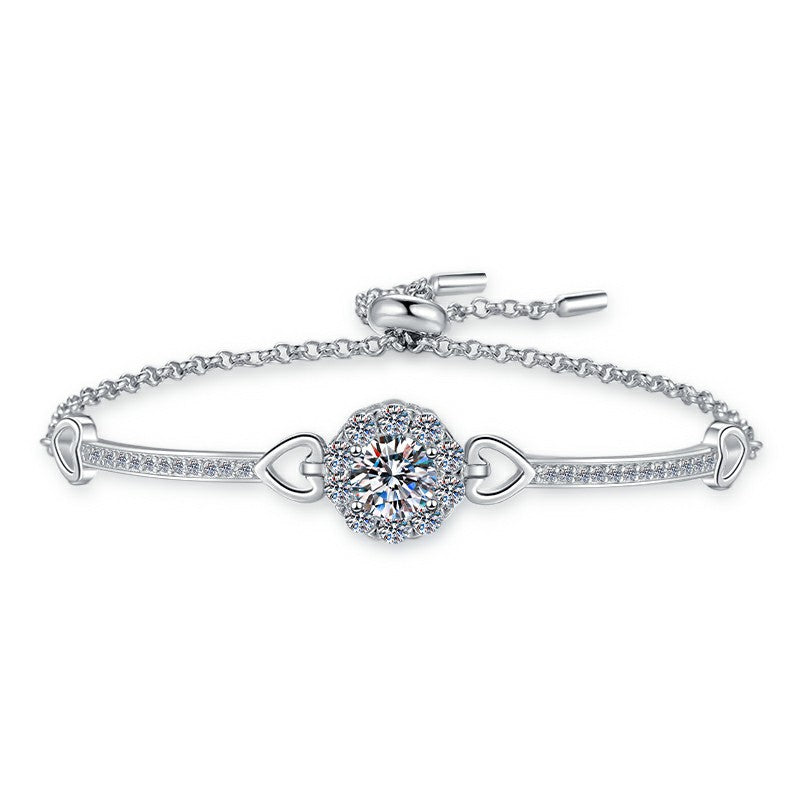 Damenarmband mit herzförmigen Elementen und funkelndem Kristall Shop Nory
