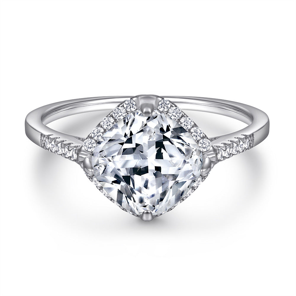 Damen Verlobungsring mit quadratischem Diamantsolitär und kunstvollen Zirkonia-Details Shop Nory