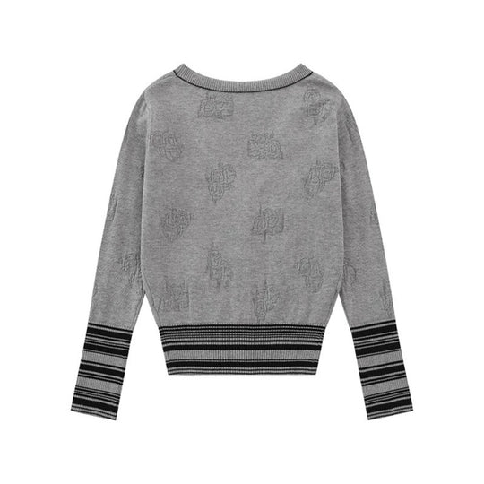 Damen Strickjacke mit V‑Ausschnitt, feinem Jacquardmuster und kontrastierenden Bündchen Shop Nory