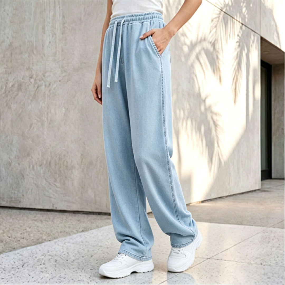 Damen nan weite Loungepalazzo-Hose mit hohem Komfortbund, Kordelzug, seitlichen Eingrifftaschen und dekorativer Seitennaht Shop Nory