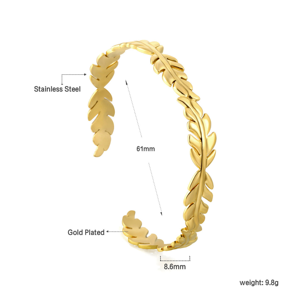Damen offener Armreif mit floralen Mustern aus hochwertigem Edelstahl und goldplattierter Oberfläche Shop Nory