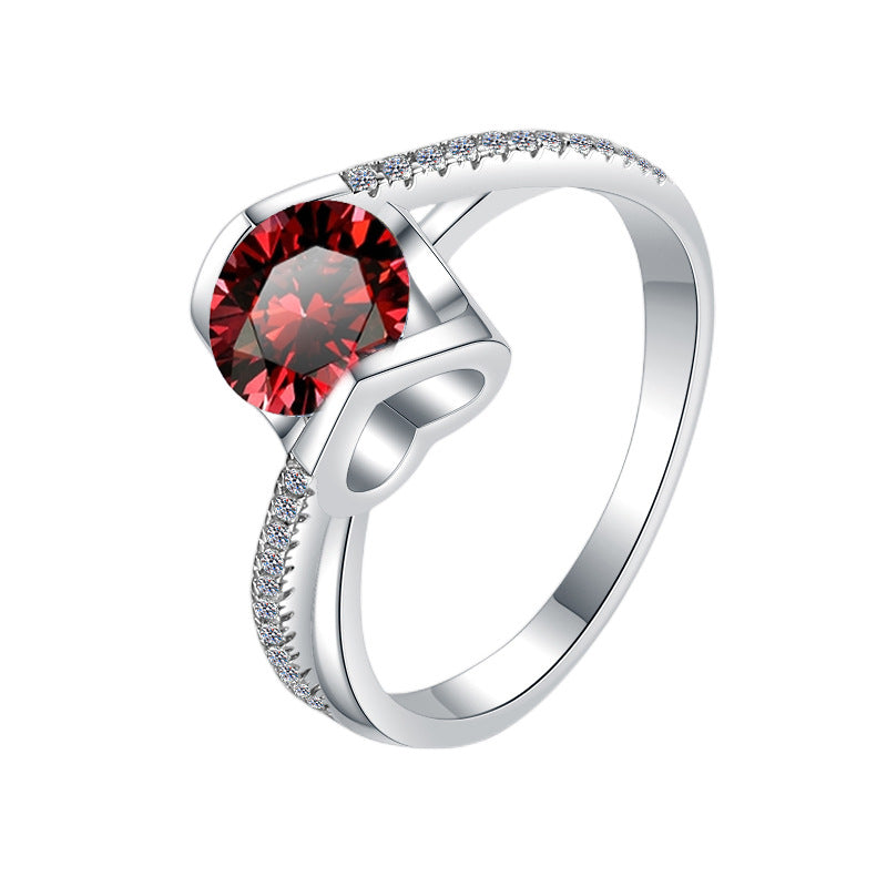 Damenring mit elegantem, facettiertem Hauptstein und funkelnden Zirkonia Shop Nory