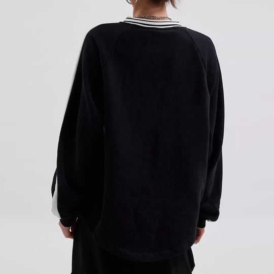 Damen Oversize Sweatshirt mit Raglanärmeln und Kontraststreifen Shop Nory
