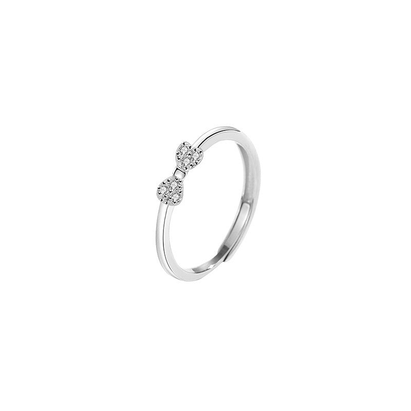 Damen Ring mit kunstvollem Schleifen-Motiv und funkelnden Zirkonia von Shop Nory