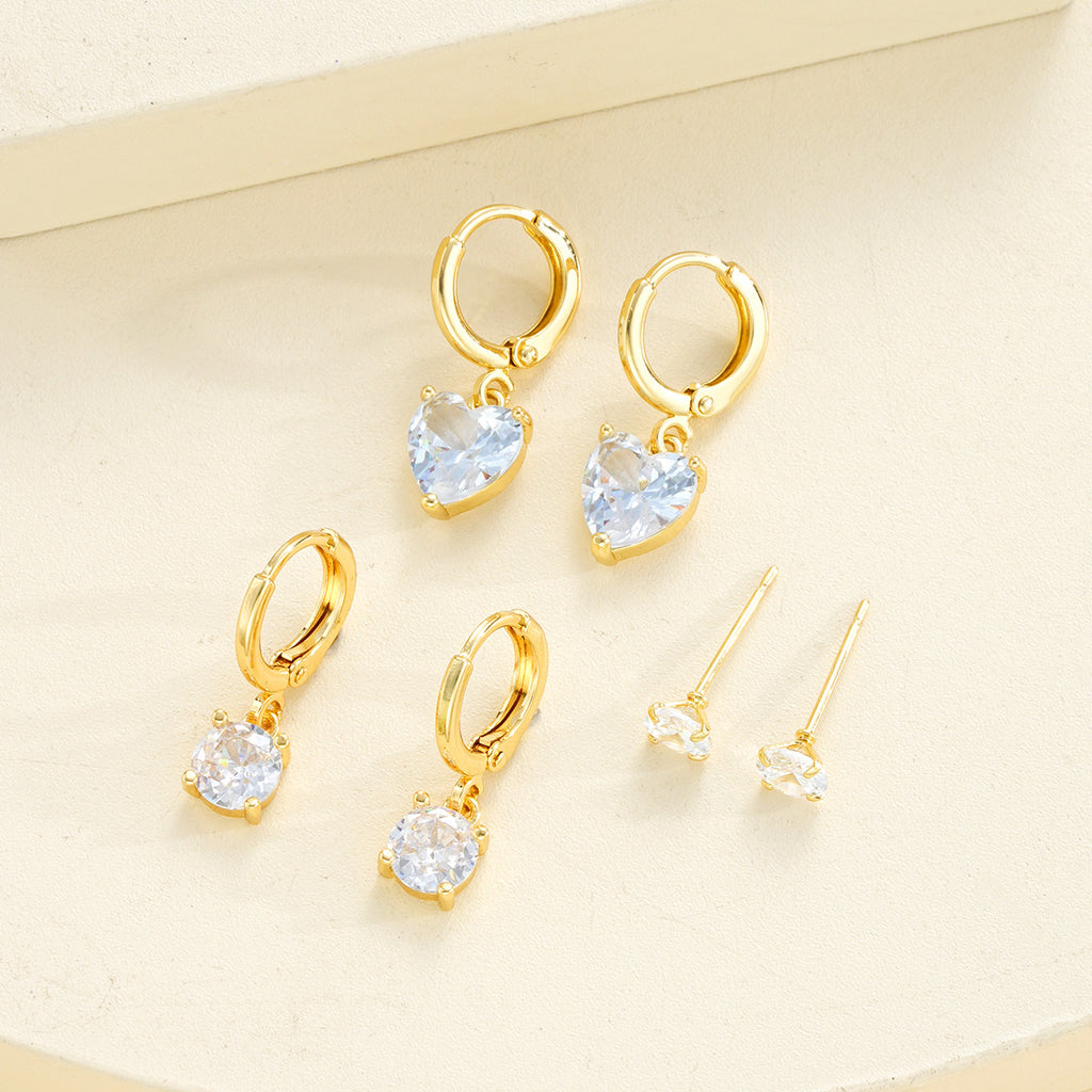 Damen Ohrringe Set mit funkelnden Kristallen und éléganten Goldrahmen Shop Nory