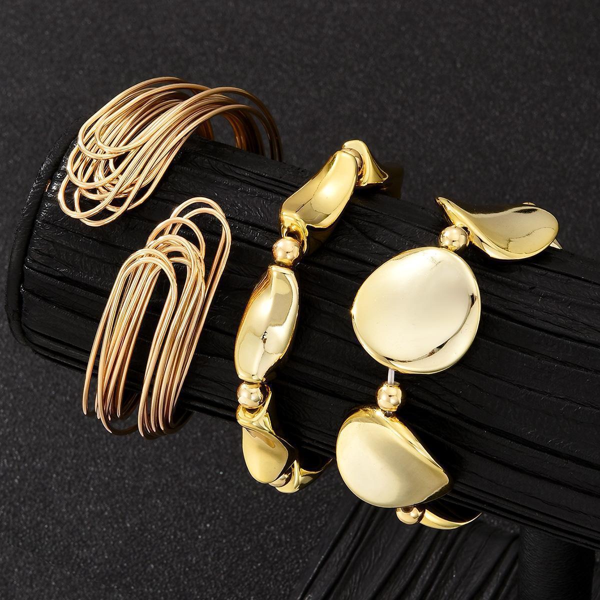 Damen Armreif-Set mit fließenden und modernen Designs Shop Nory