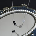 Damen Halskette mit kunstvollen Glasperlen und modernem Designelement Shop Nory