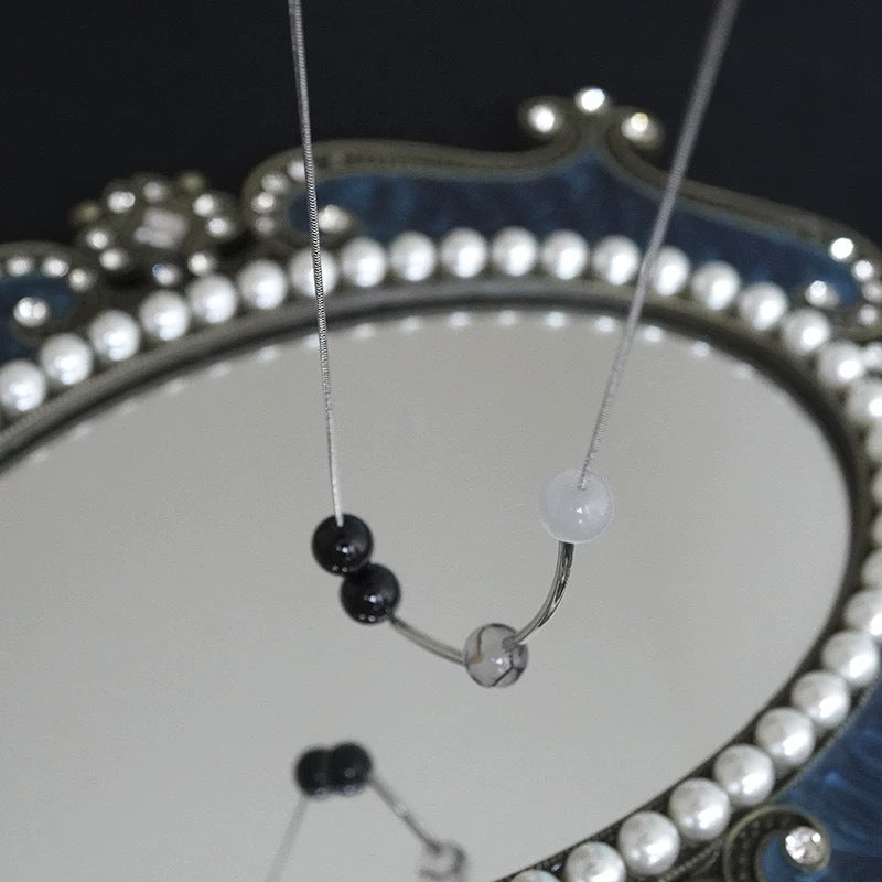 Damen Halskette mit kunstvollen Glasperlen und modernem Designelement Shop Nory