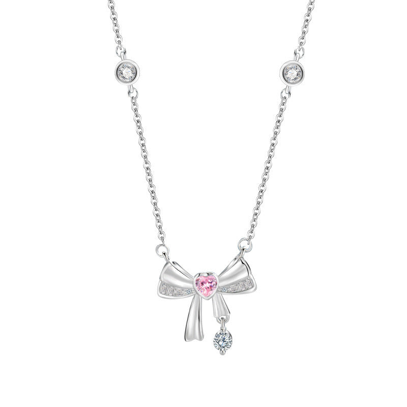 Damen Halskette mit elegantem Schleifenanhänger und funkelnden Kristallakzenten Shop Nory
