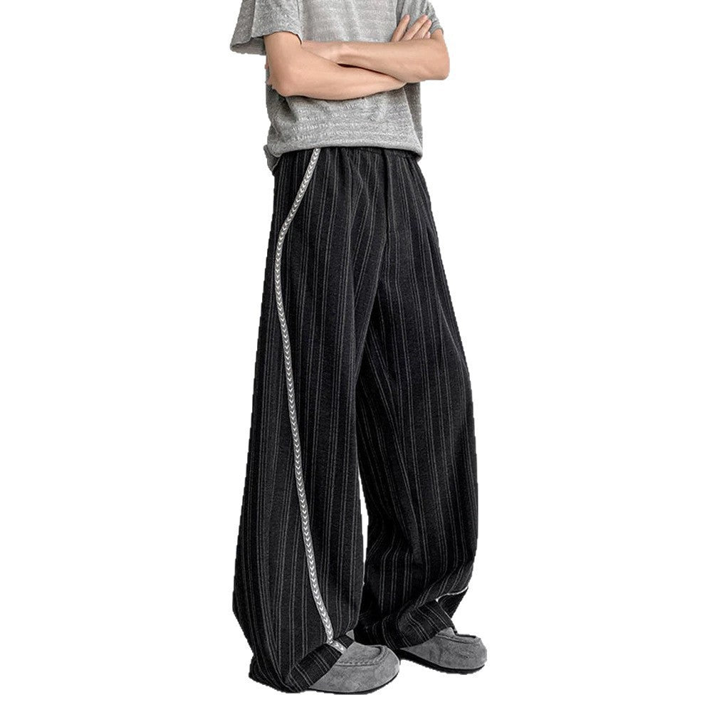Herren weite Baggy-Hose in Anzugoptik mit feinem Nadelstreifen und geflochtener Seitenpaspel Shop Nory