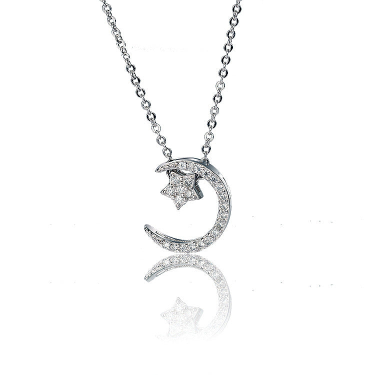Damen Halskette mit mondförmigem Anhänger und funkelnden Zirkonia-Elementen Shop Nory