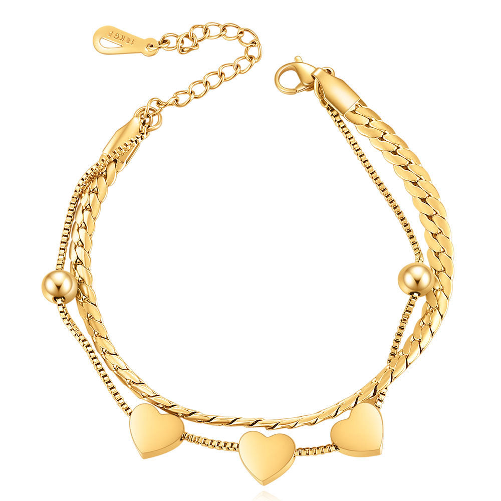 Damen Armband mit elegantem Herzdesign und feinen Kettengliedern Shop Nory
