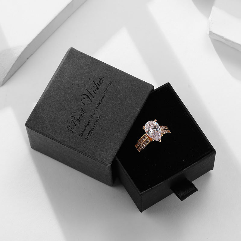 Damen eleganter Ring mit ovalem Kristall und funkelnden Zirkonia-Steinen Shop Nory
