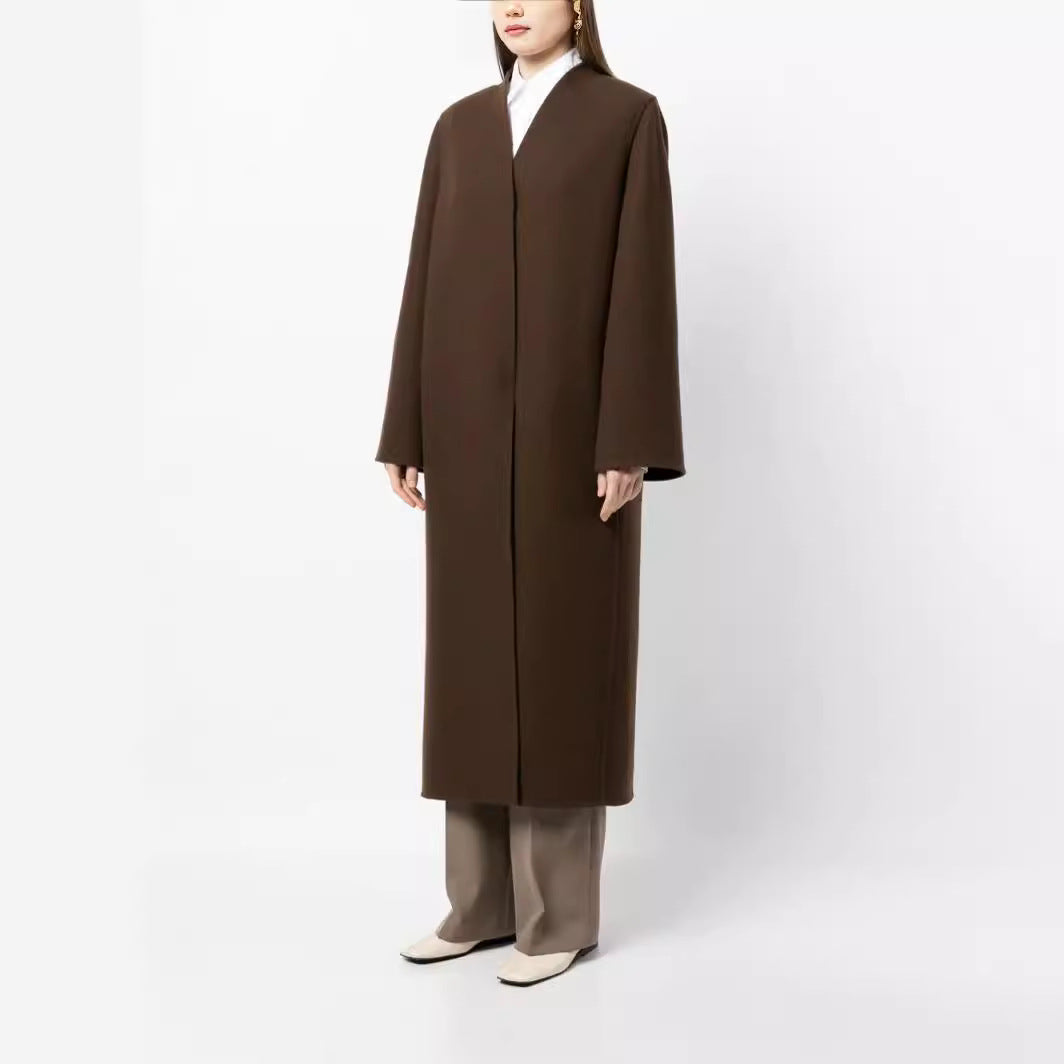 Damen Maxilanger minimalistischer Mantel mit verdeckter Front und kastiger Schulter Shop Nory