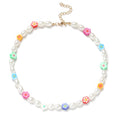 Damen Halskette mit bunten Blumenelementen und eleganten Perlen Shop Nory